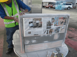 Repair and repainting of pump leaders and decal installation