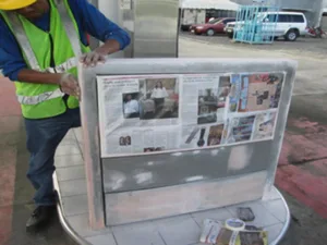 Repair and repainting of pump leaders and decal installation
